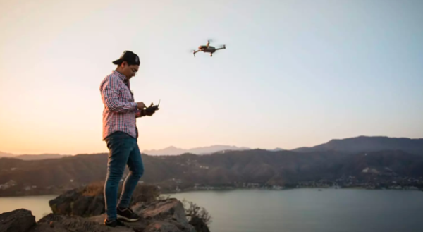 person on the clip flying drone as a drone pilot