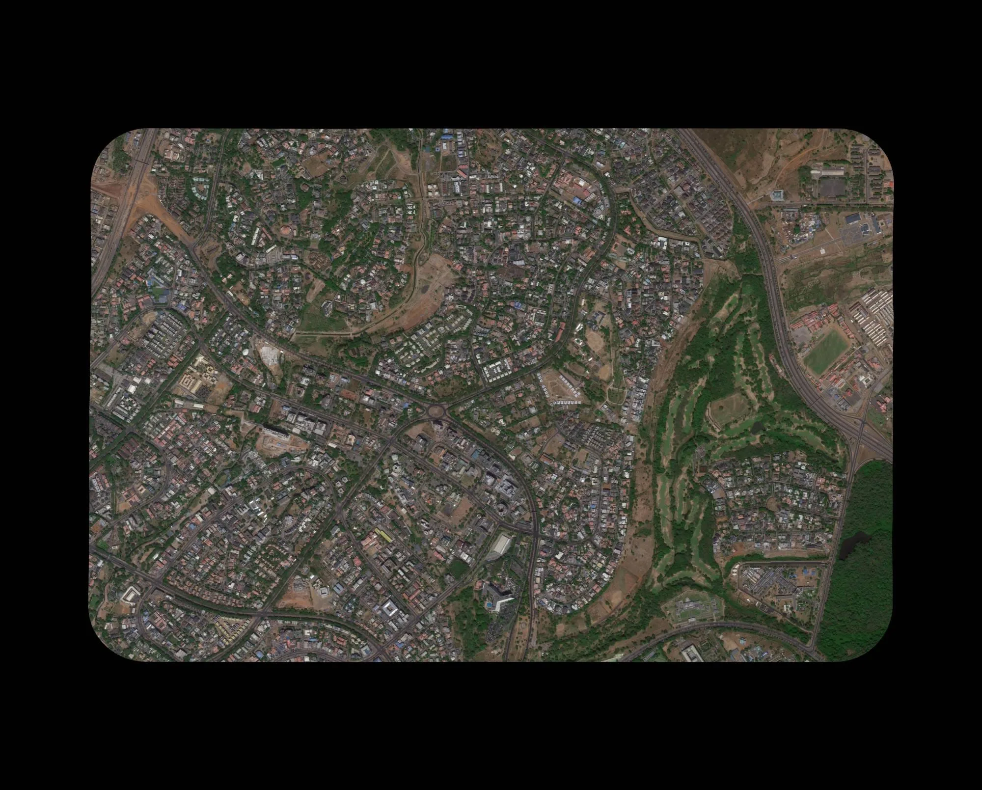 Nigeria 30cm high resolution satellite imagery sample — panchromatic optical earth observation data showing urban infrastructure at 0.3m resolution — XRTech Group