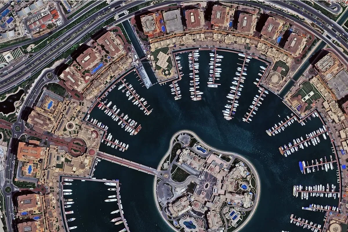 High resolution of Doha, Qatar, by SuperView NEO-1 satellite imagery showing detailed urban landscape with roads, buildings, vehicles, and infrastructure captured at 30 cm spatial resolution for geospatial analysis and mapping