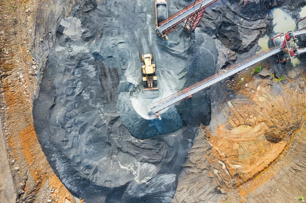 Satellite monitoring of an open pit mine and tailings