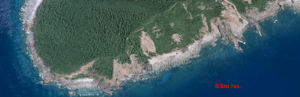 0.8 metre high resolution satellite imagery example — roads and large structures visible but individual vehicles not reliably resolved — XRTech Group