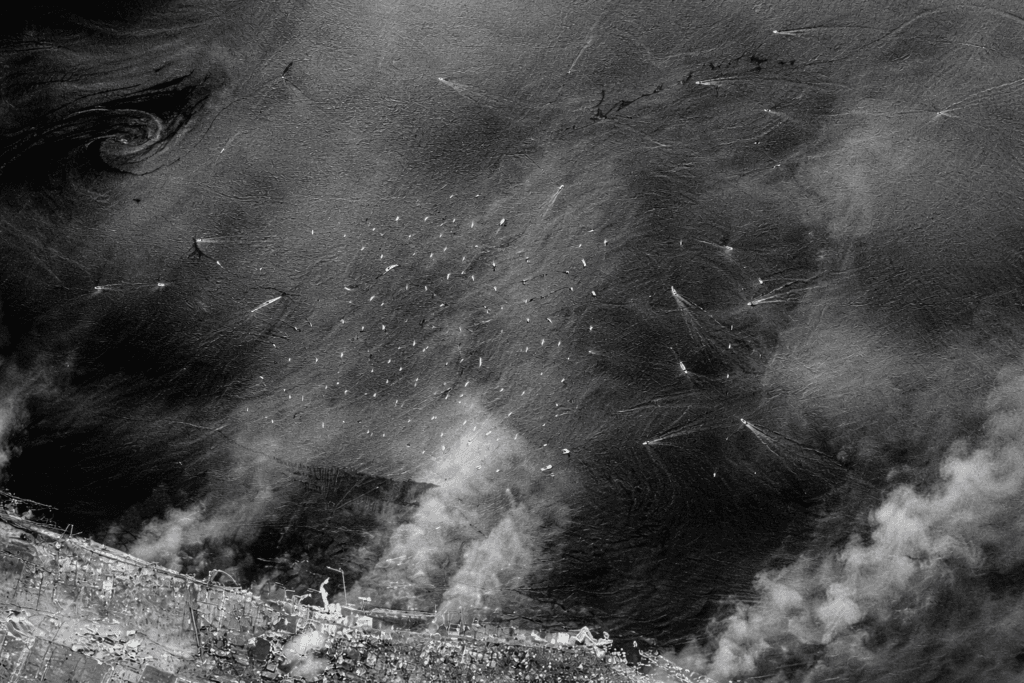 Radar satellite view of an oil spill spreading across the sea surface near the coast